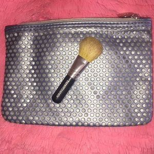 Makeup bag with mini face brush